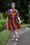 ladies short dress with butterfly sleeves in an animal rainbow pattern