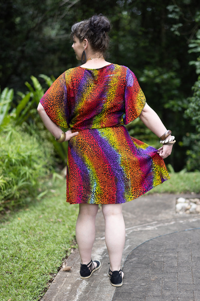 ladies short dress with butterfly sleeves. Animal rainbow pattern